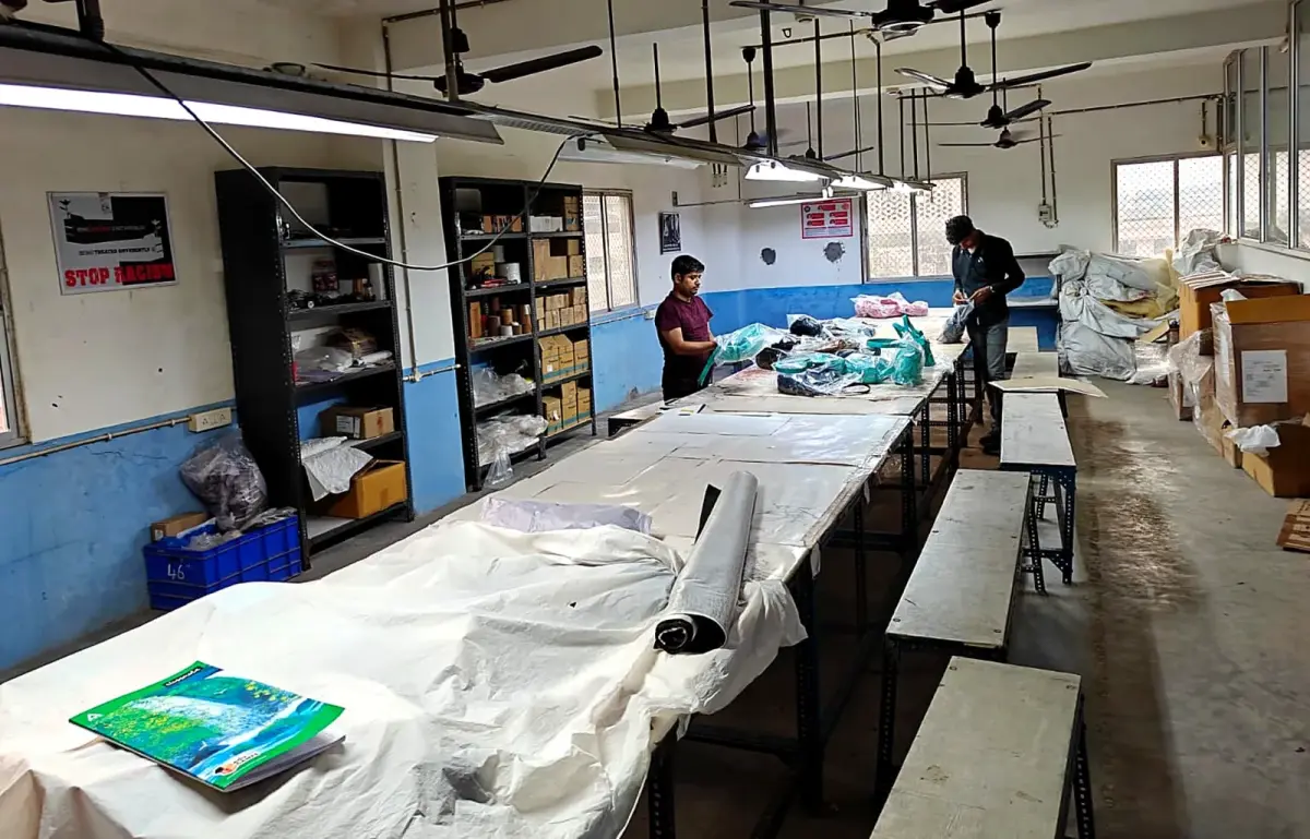The team mid-run. Units are assembled and checked at the table before they leave it.